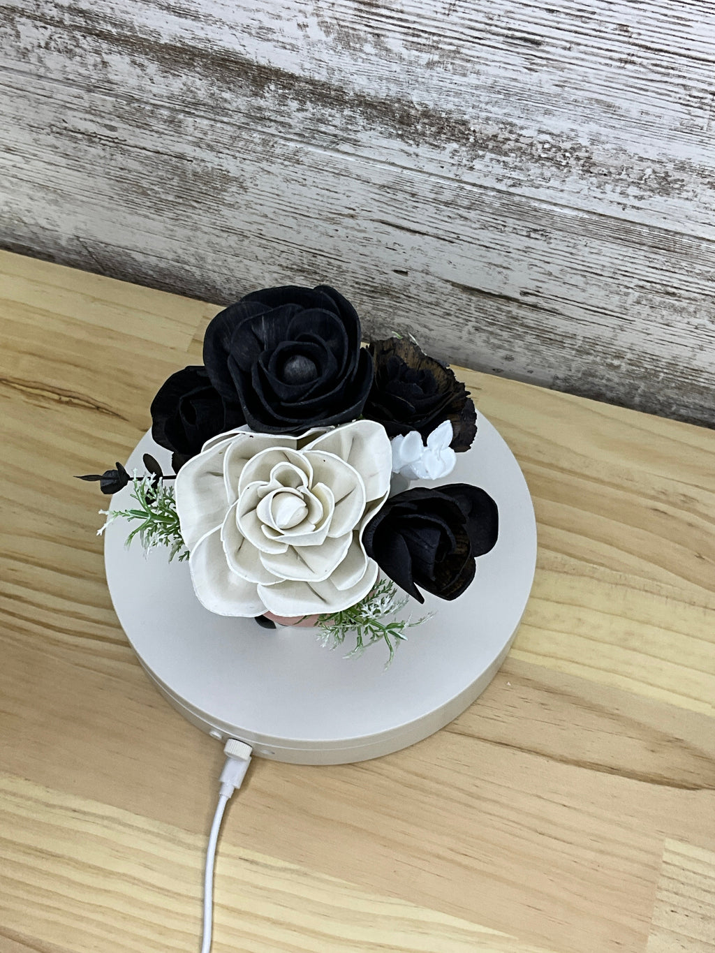 Black & White Sola Wood Flower Arrangement in Cow Ceramic Mini Mug