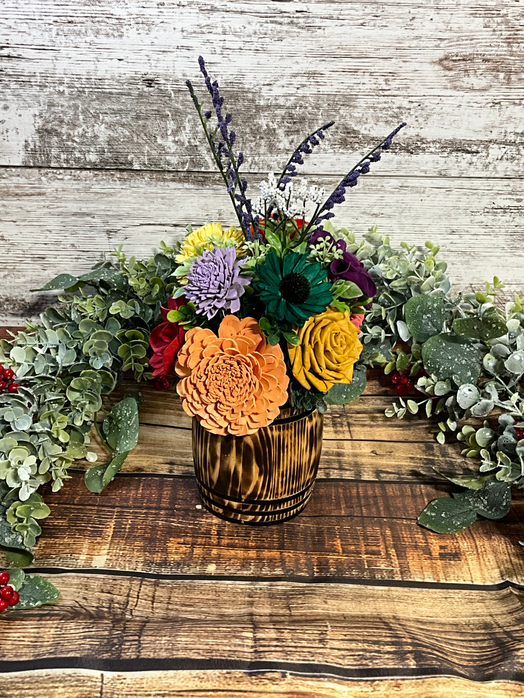 Vibrant Rainbow Sola Wood Flower Arrangement in Oak Stained Whiskey Barrel