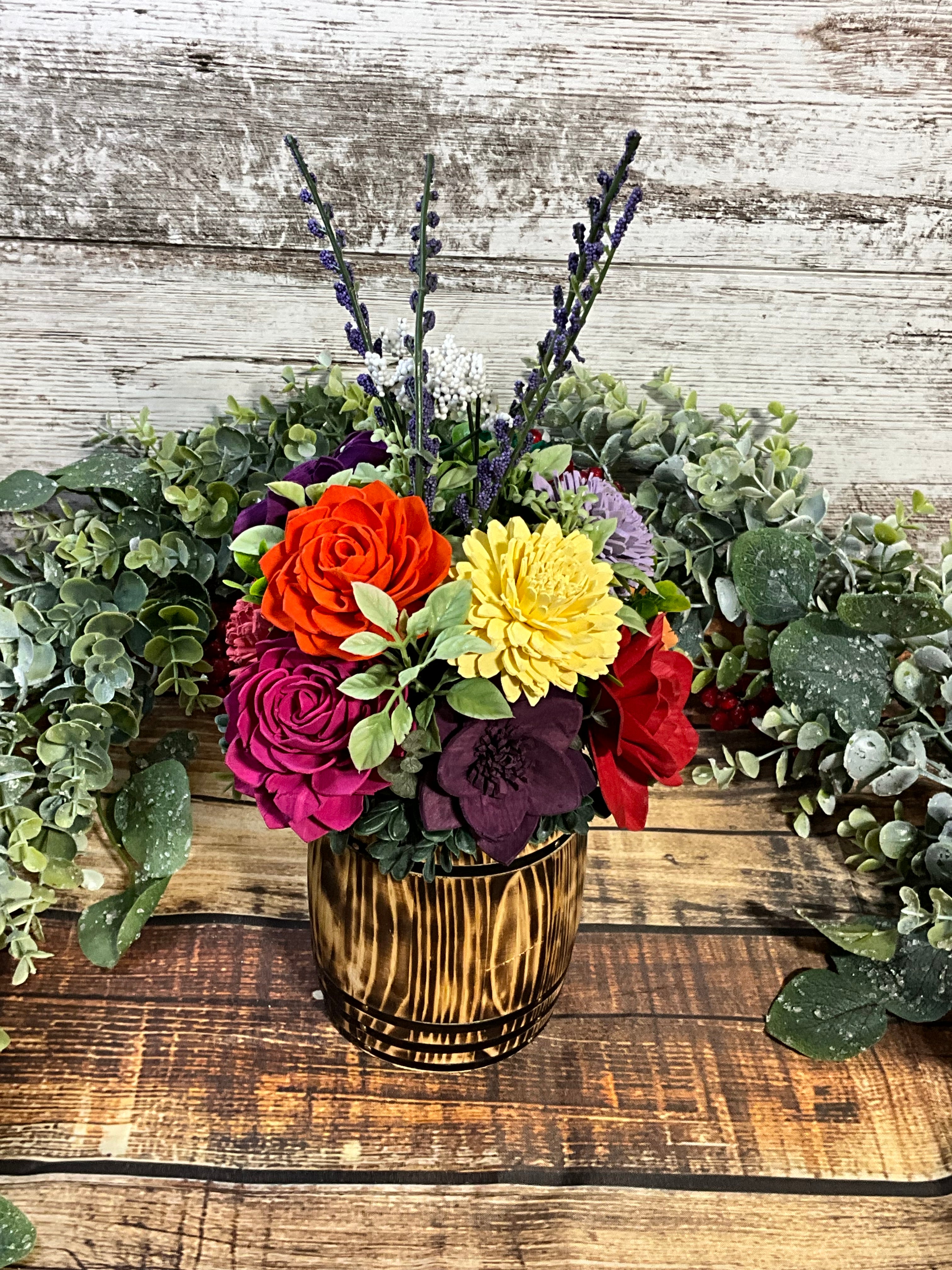 Vibrant Rainbow Sola Wood Flower Arrangement in Oak Stained Whiskey Barrel