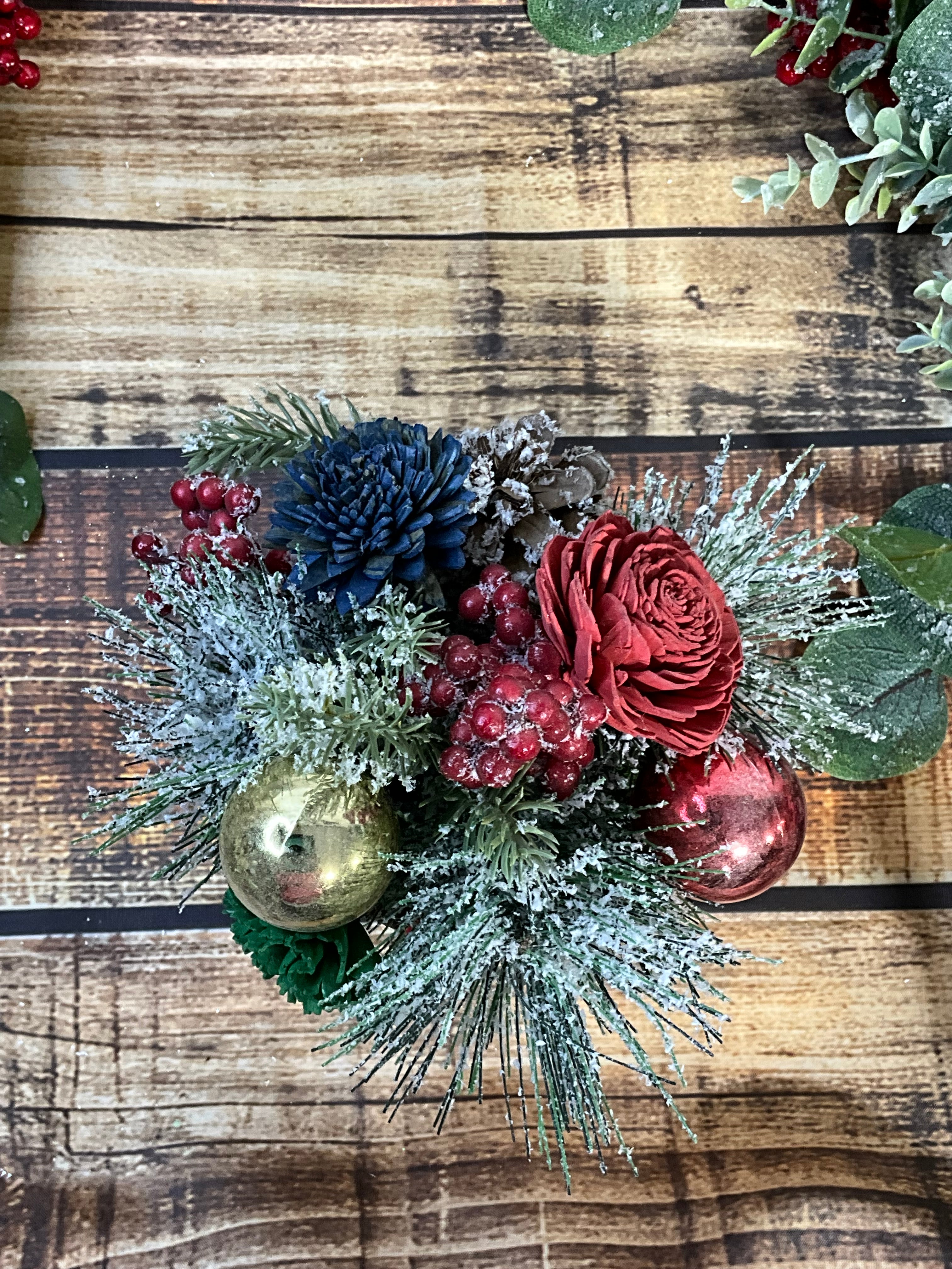 Frosty Blue Christmas Sola Wood Flower Arrangement in Red Tree Tin