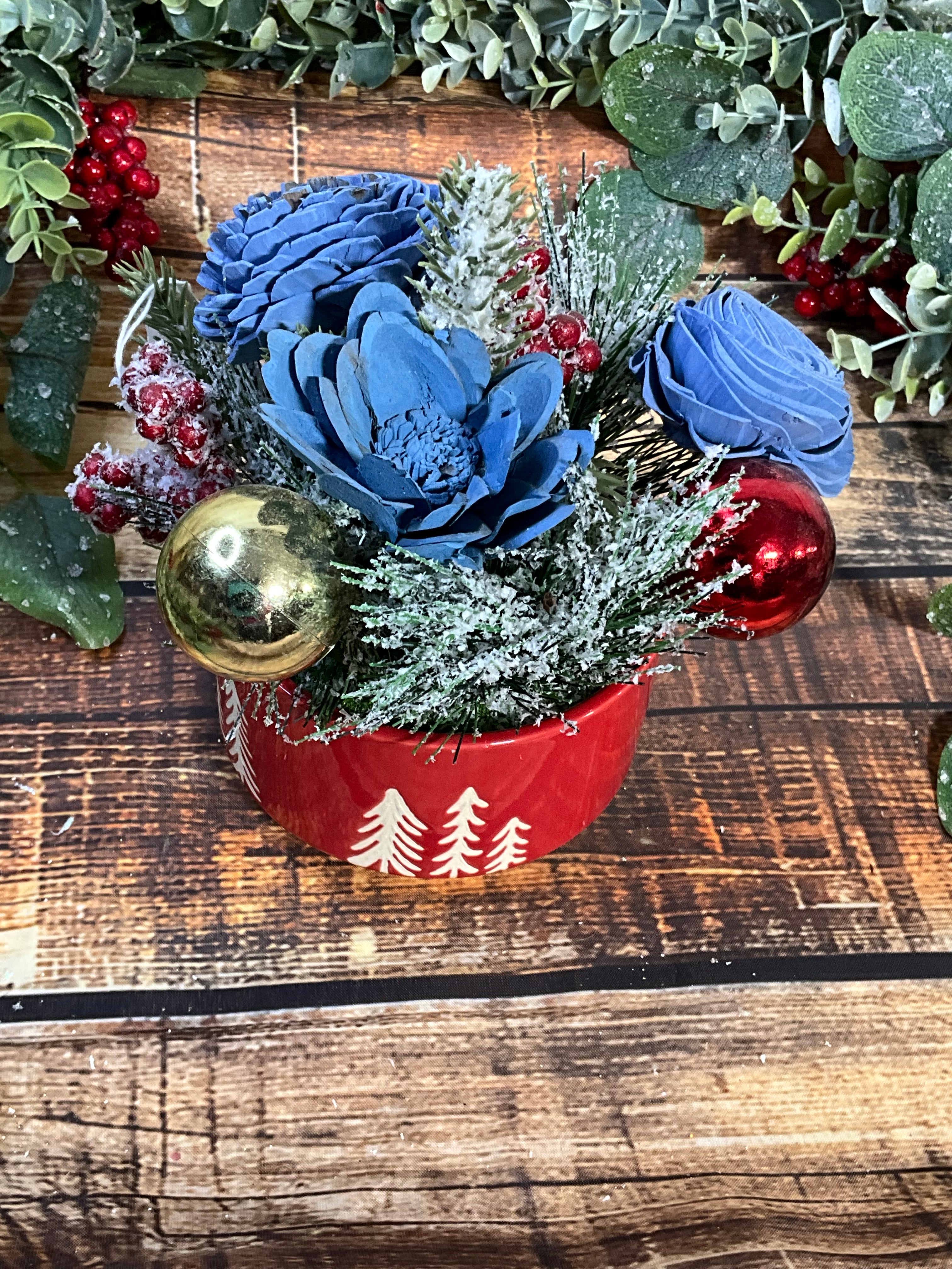 Frosty Blue Christmas Sola Wood Flower Arrangement in Red Tree Tin
