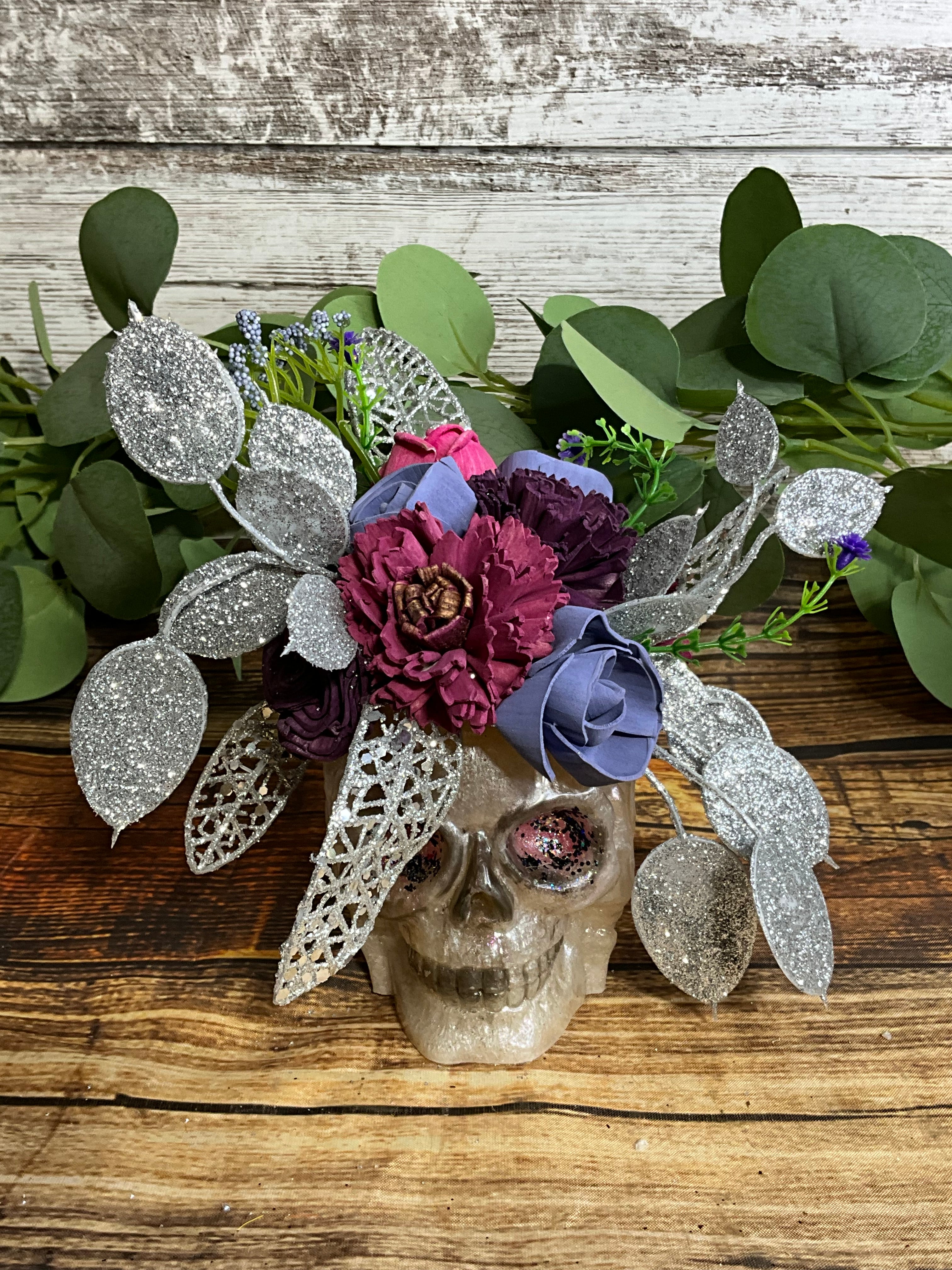 Gothic Glam Sola Wood Flower Arrangement in Skull Planter