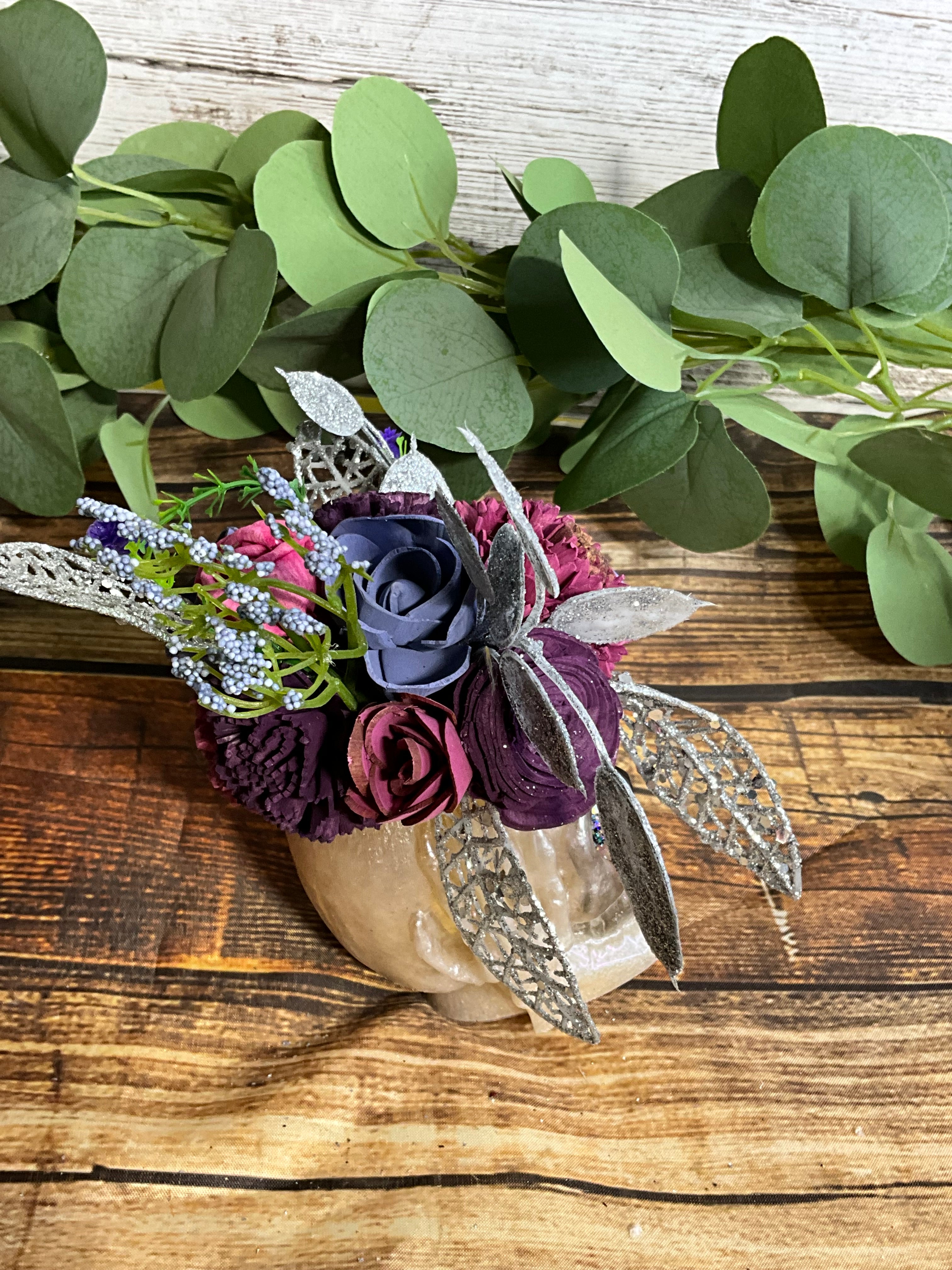 Gothic Glam Sola Wood Flower Arrangement in Skull Planter