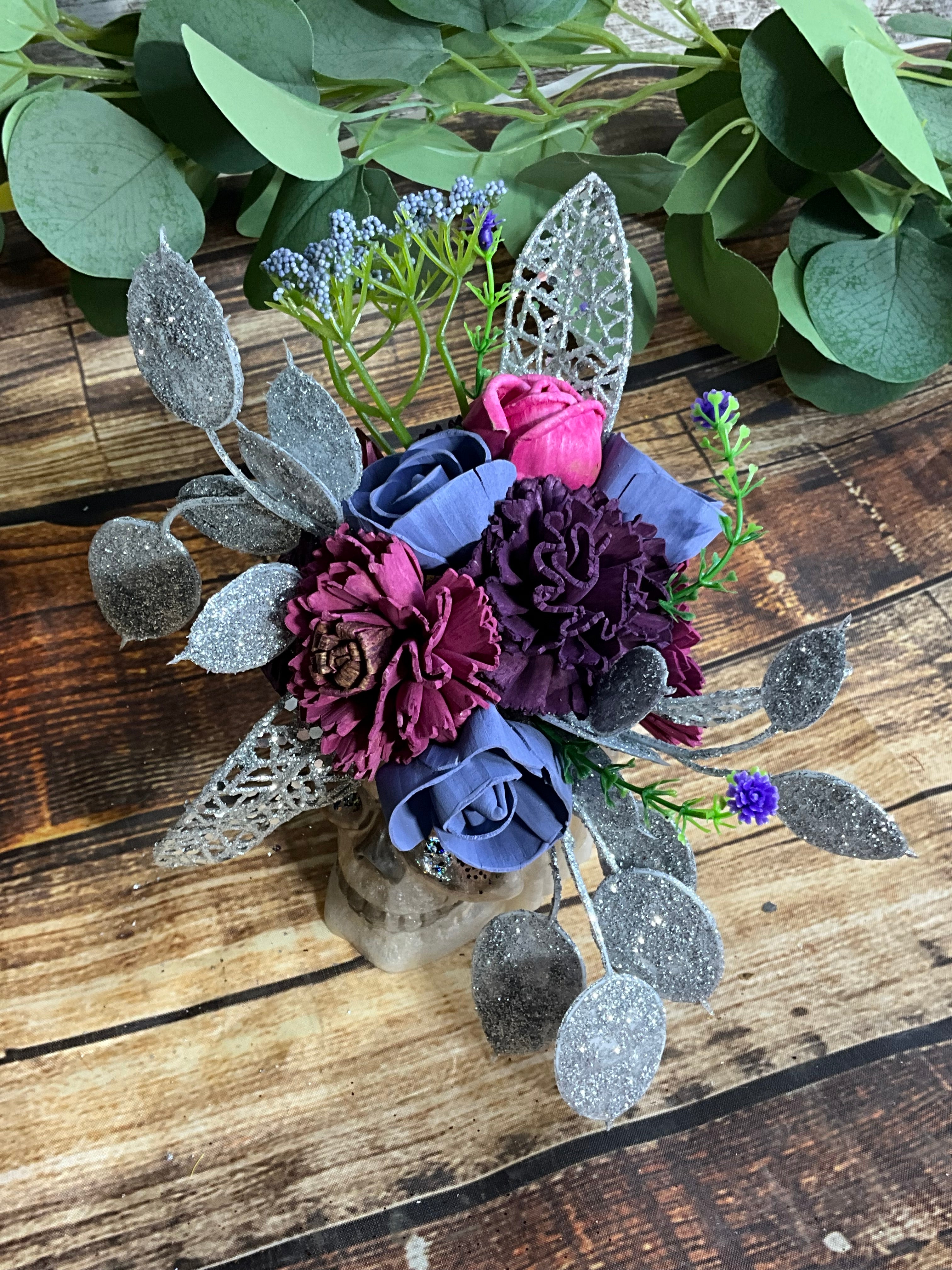 Gothic Glam Sola Wood Flower Arrangement in Skull Planter