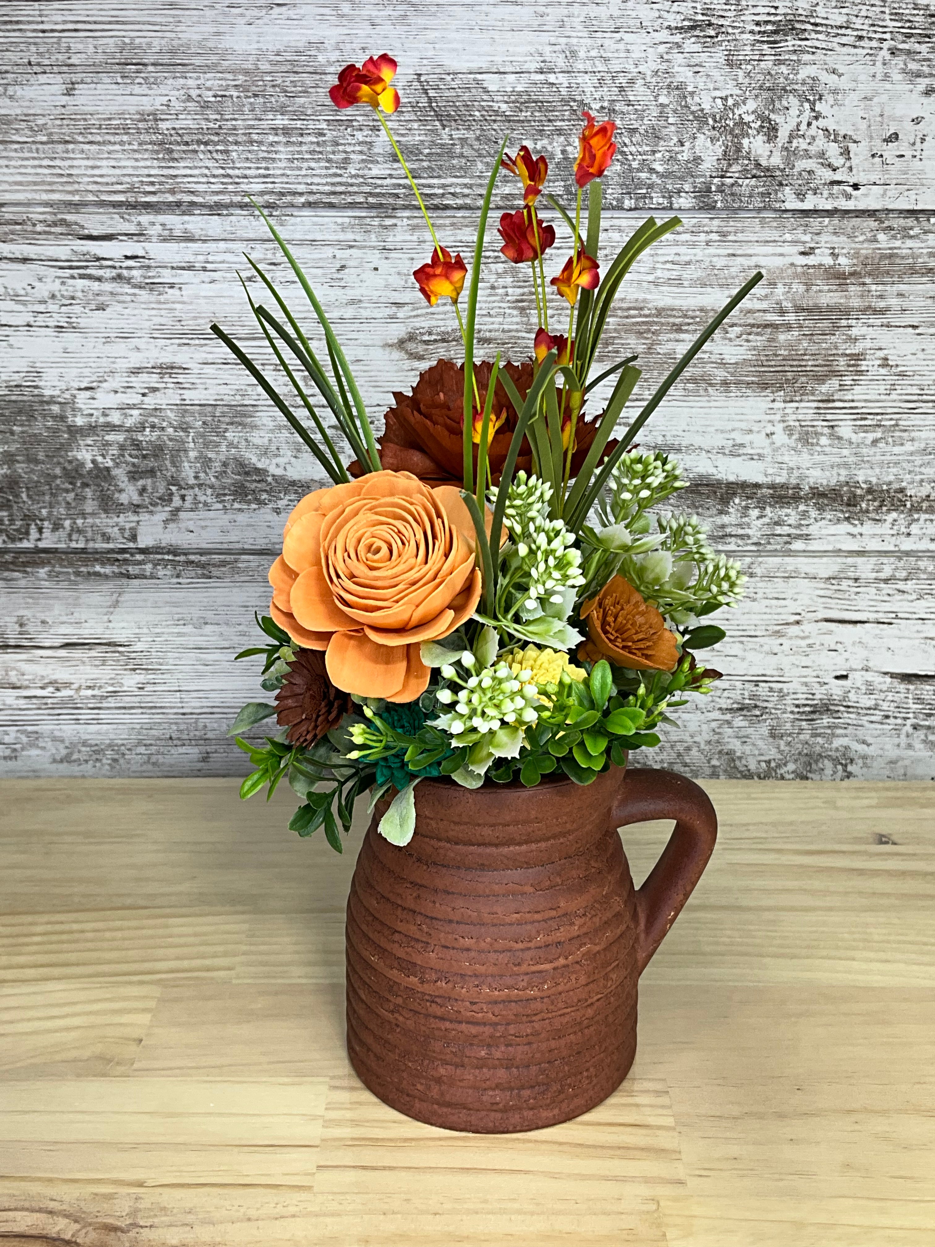 Harvest Sola Wood Flower Arrangement in Terracotta Pitcher