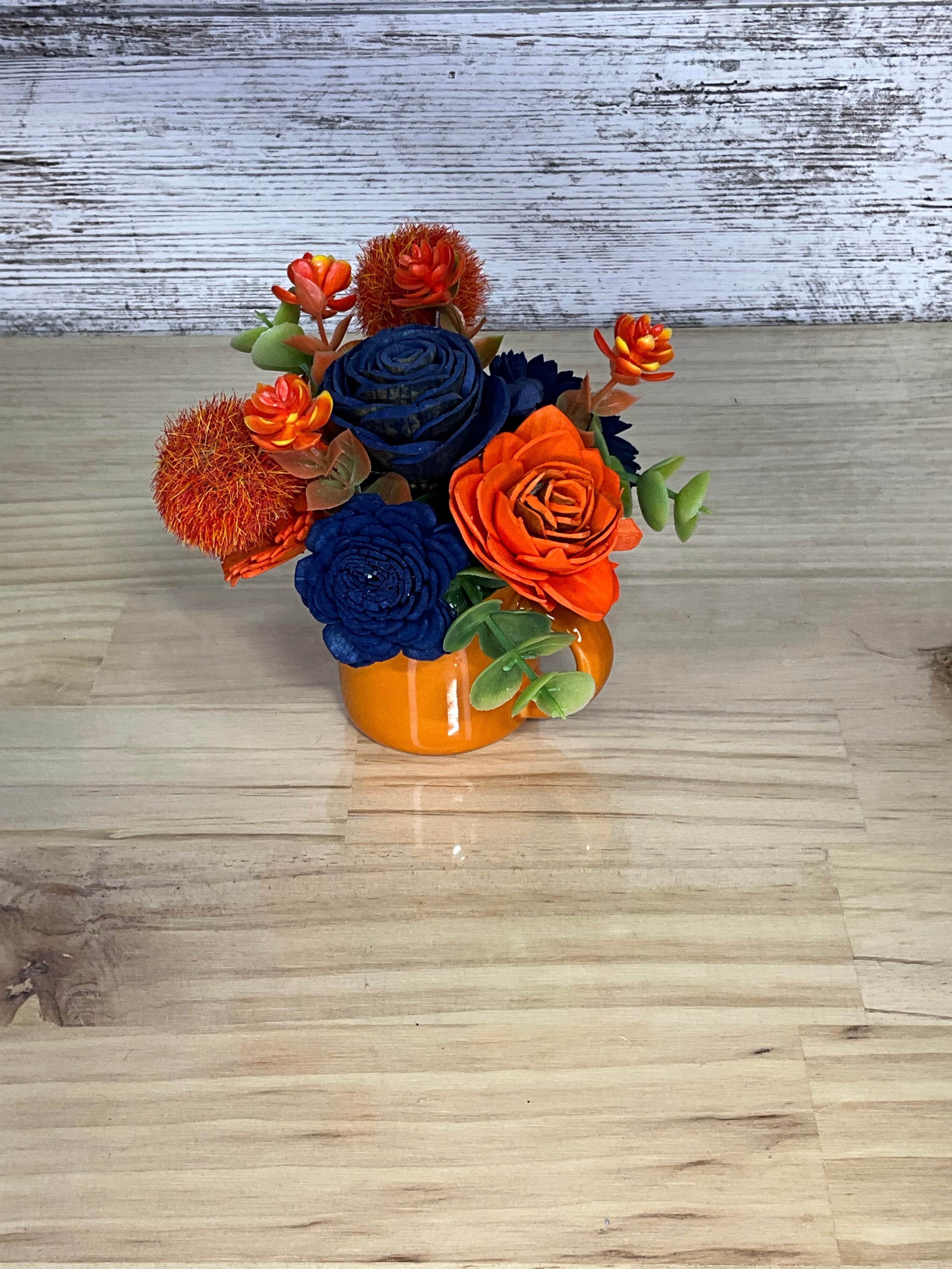 Navy & Orange Sola Wood Flower Arrangement in Glossy Orange Ceramic Mug