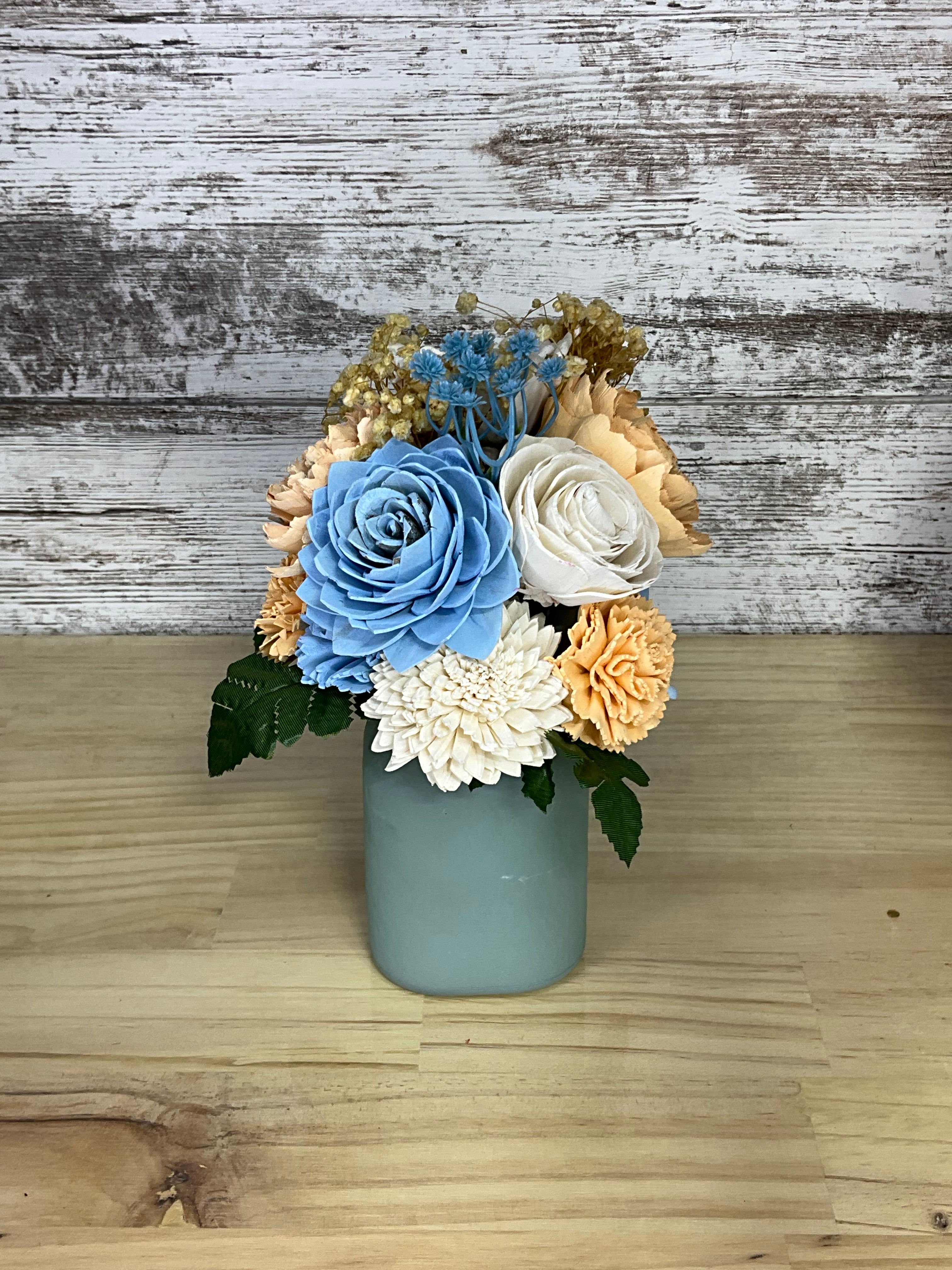 Coastal Sunrise Sola Wood Flower Arrangement in Sage Blue Vase