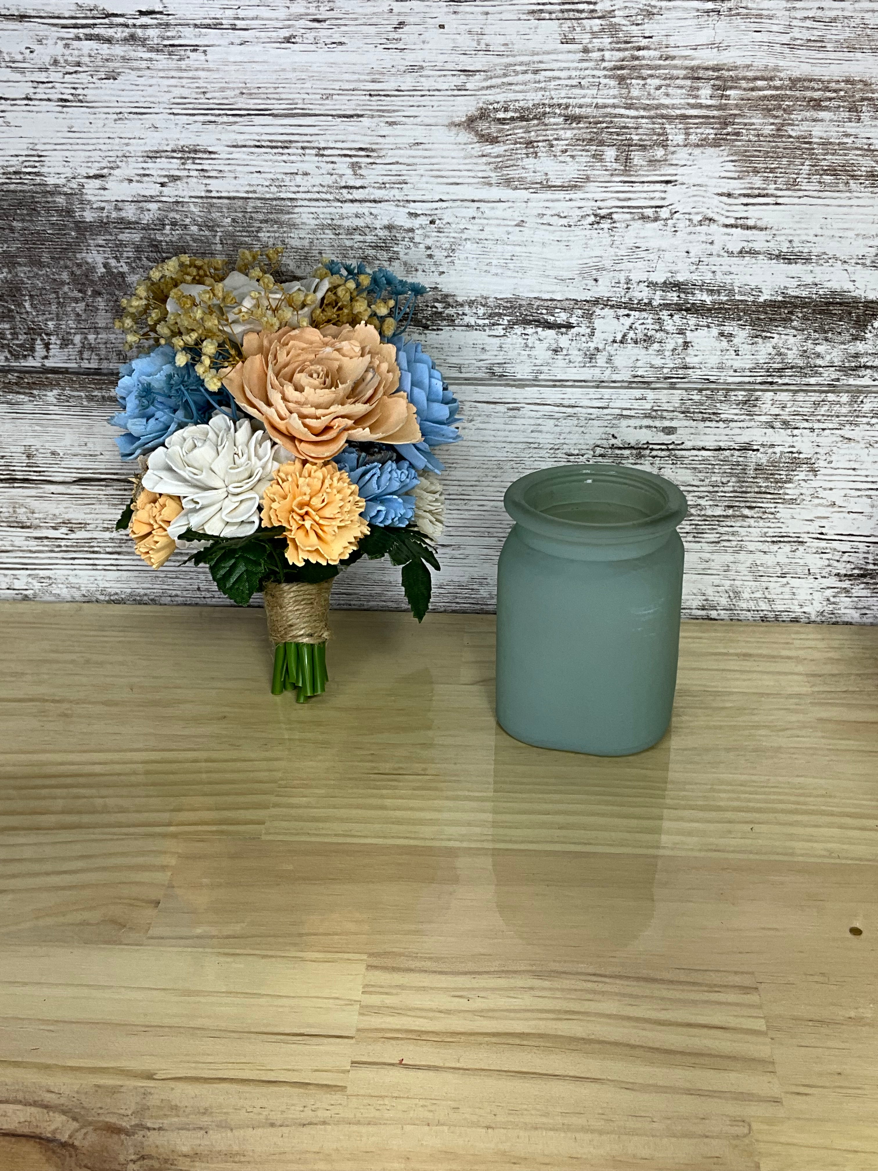 Coastal Sunrise Sola Wood Flower Arrangement in Sage Blue Vase