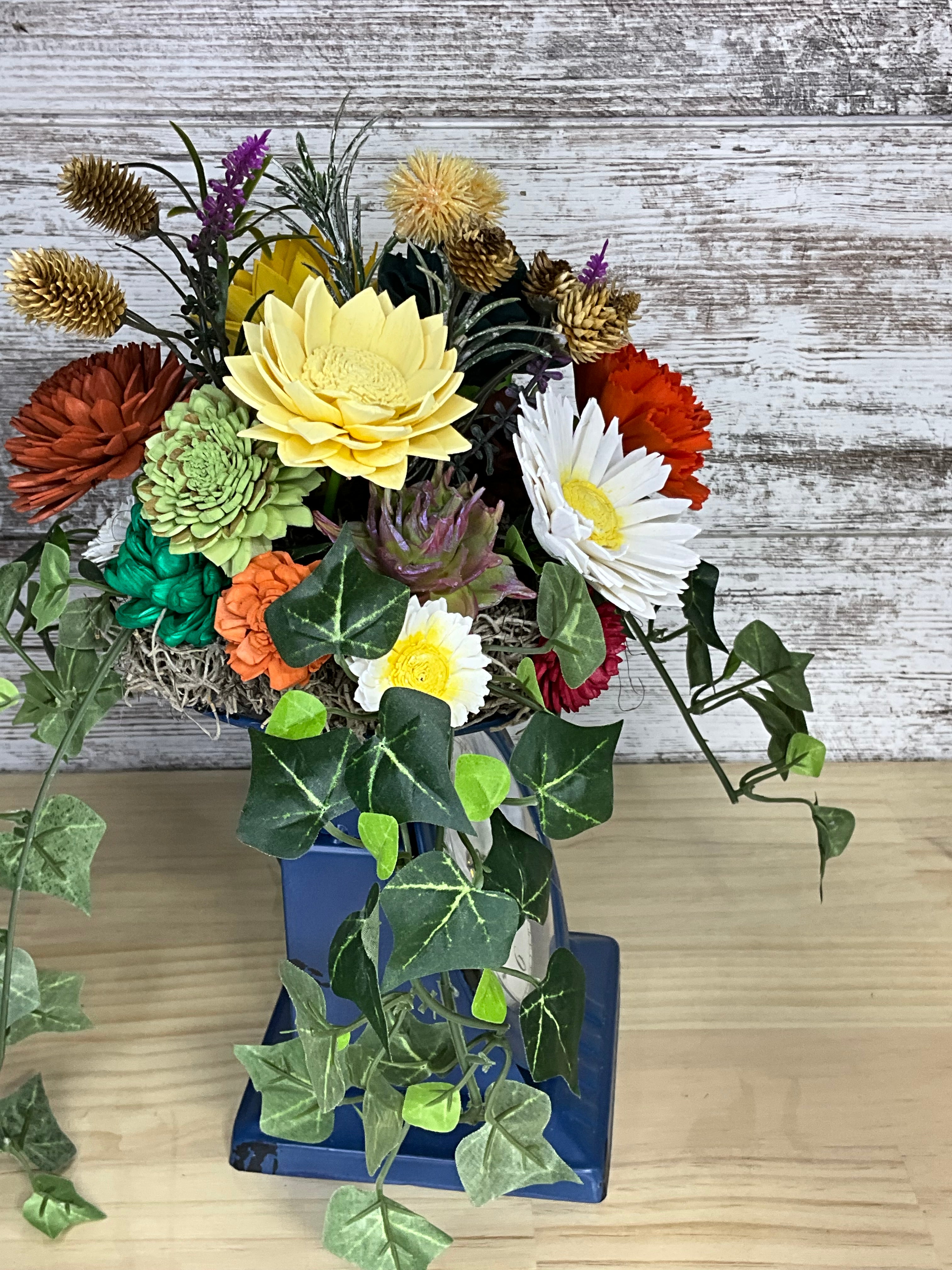 Sola Wood Flower Arrangement in Vintage Clock Vase