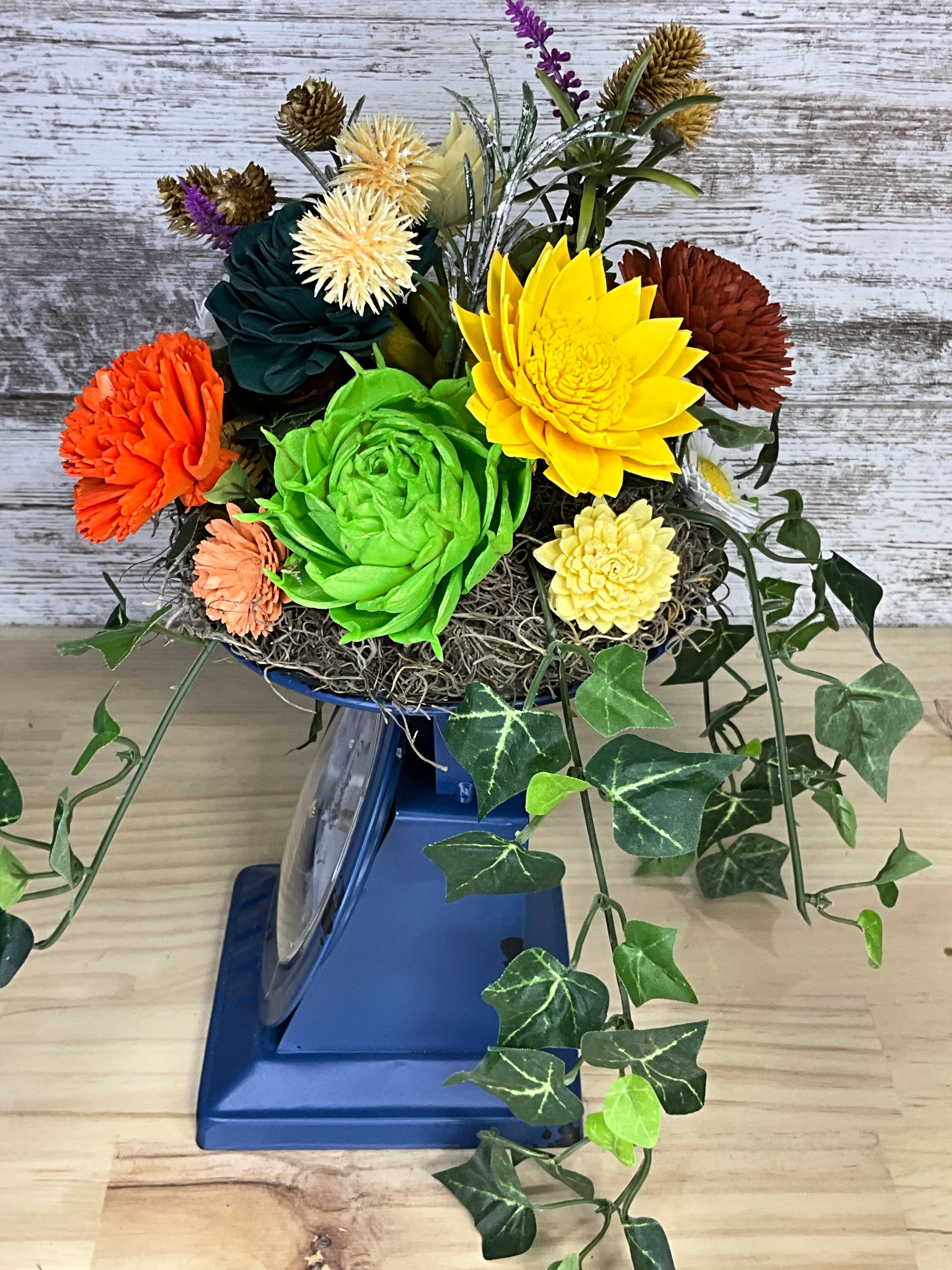 Sola Wood Flower Arrangement in Vintage Clock Vase